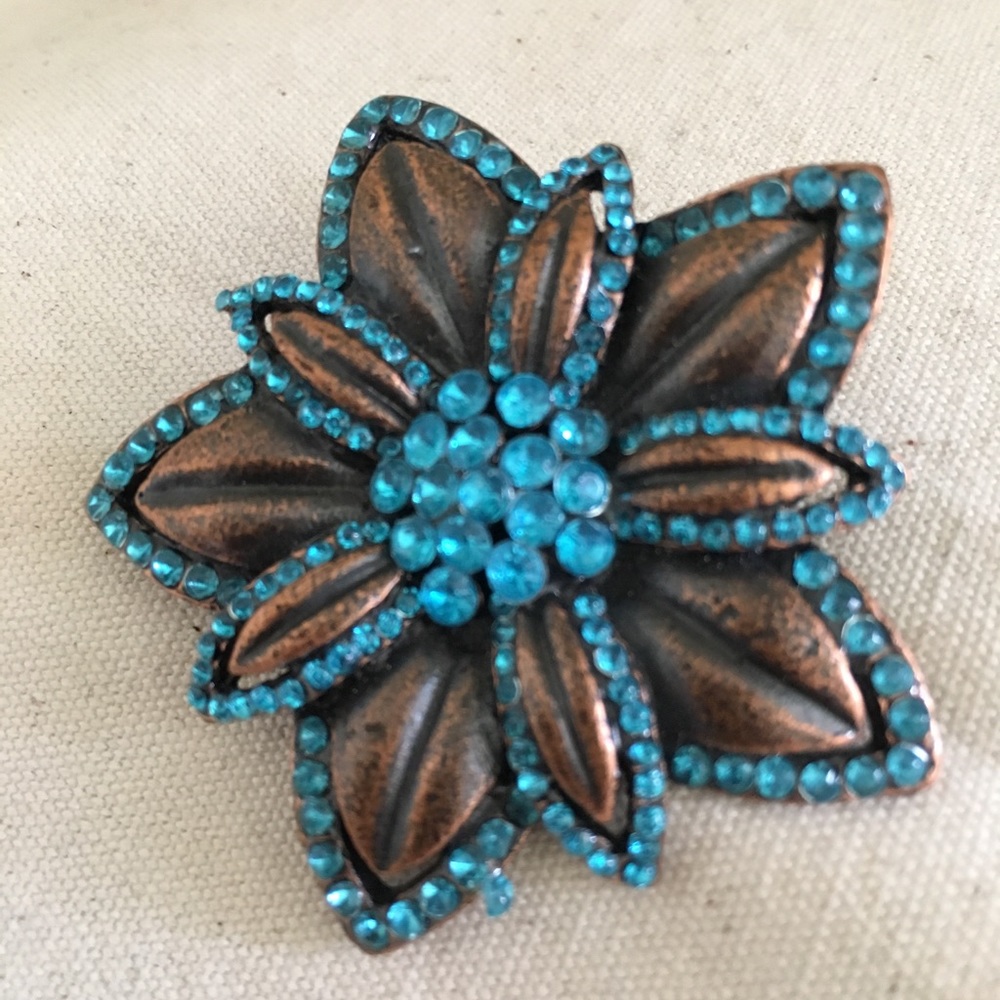 Crystal embellished metal brooch